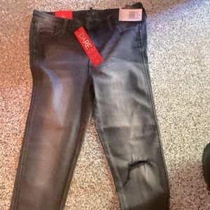 NWT: Distressed black jeans with stylish riveting at hem